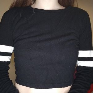 Black crop top .